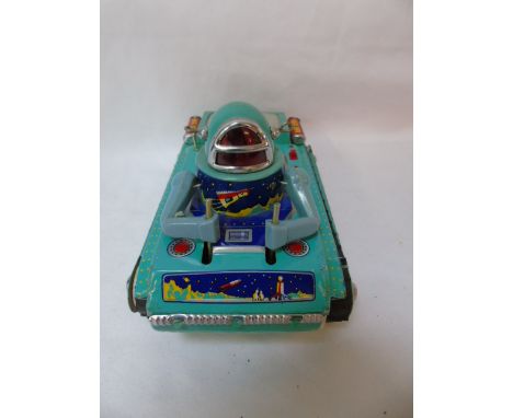 Vintage tin plate space tank toy