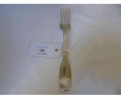 An 18th Century silver fiddle pattern table fork 7.75" long (Thought to be Channel Islands - identical triple struck crowned 