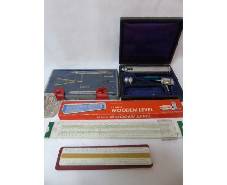 Assorted rulers, drawing eqpt and a cased medical item