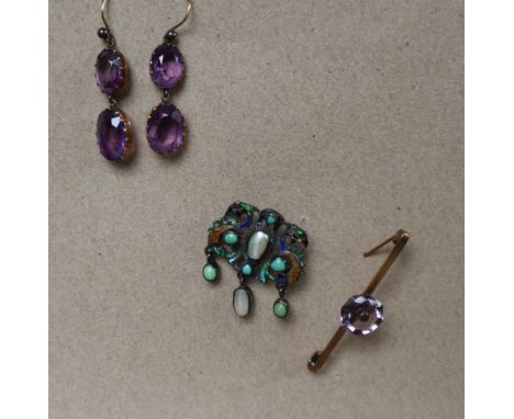 An Arts and Crafts inspired white metal brooch set with irregular pearls and turquoise beads with enamel decoration together 
