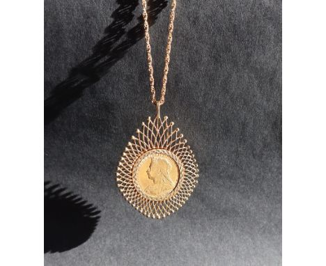 A late Victorian gold sovereign dated 1899, in a 9ct gold setting on a 9ct gold chain, overall approximately 17 grams