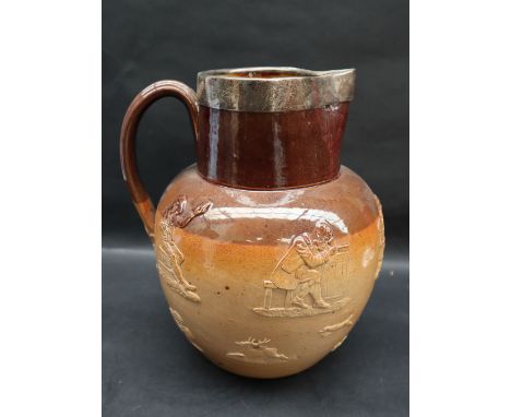 A Doulton & Co stoneware jug, the with a silver rim, the body decorated with figures and a stag hunting scene, impressed mark