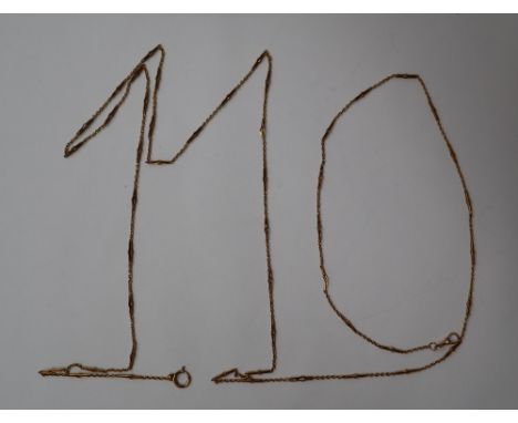 A yellow metal long chain, with oval and elongated links, unmarked, 158cm long, approximately 30 grams