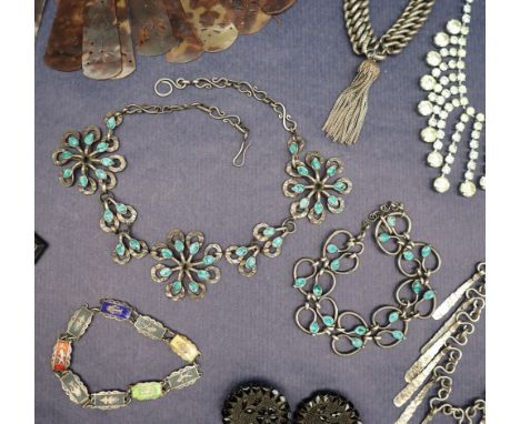 A white metal and enamel decorated necklace in the form of three flower heads, together with white metal and enamel bracelet,