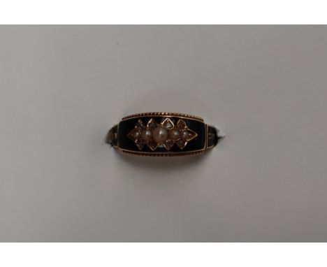 A Victorian 15ct gold mourning ring set with half pearls and black enamel and Memory, size M, approximately 3 grams