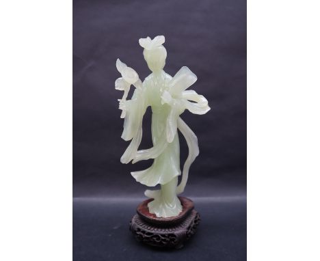 A 20th century Chinese pale jade figure of a Geisha on a wooden stand, boxed, 20cm high  CONDITION REPORT: Possible minor chi