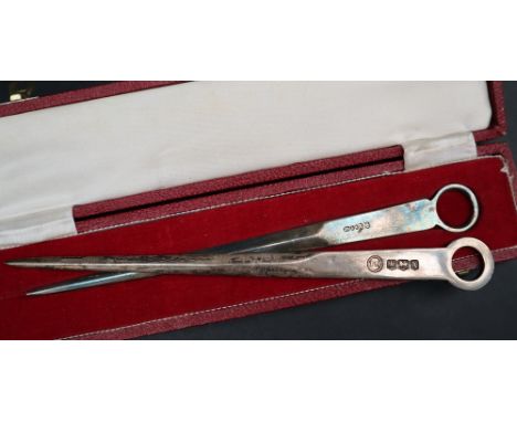 An Elizabeth II silver letter opener with ring handle, Sheffield, 1965, Francis Howard Ltd, cased together with an electropla