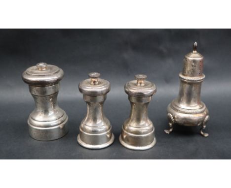 A pair of George V silver pepper mills / grinders, Sheffield, 1929, Mappin & Webb, together with an American Sterling silver 