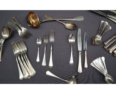 A continental 800 standard part flatware service comprising nine table spoons, nine table forks, nine table knives, nine dess