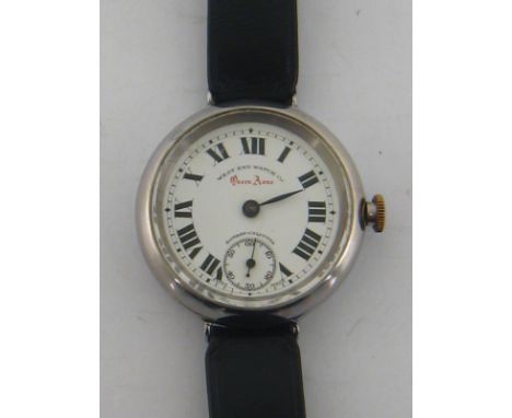 West End Watch Co. Bombay-Calcutta, an early 20th century silver plated oversized 'Queen Anne' trench watch, the signed white