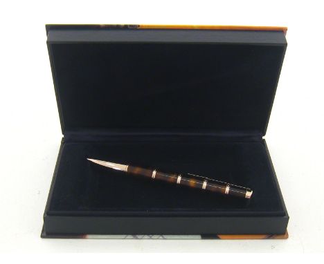 MONTBLANC, Writer's Series 'Miguel de Cervantes', a brown enamel and gilt limited edition roller ball pen, no. 13227/17000, i