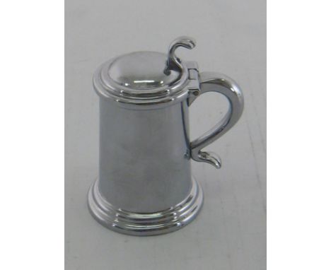 DUNHILL, a chrome plated novelty lighter, designed in the form of a covered tankard, 7cm high
