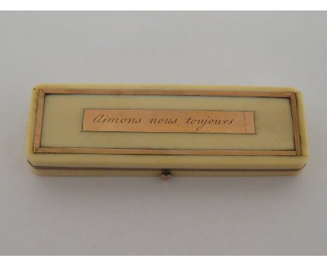 A gold-mounted ivory toothpick box, circa 1800, rectangular with cut corners, centred by a gold panel inscribed “Aimons nous 