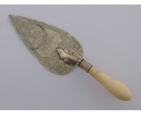 A Victorian ivory handled  engraved silver presentation trowel  by George Maudslay Jackson, London, 1884. CONDITION REPORT: V