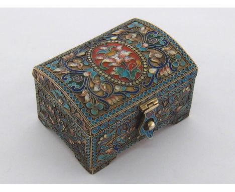 A silver-gilt and cloisonné enamel casket bearing spurious Russian marks, cover with hinged clasp, on bracket feet, decorated