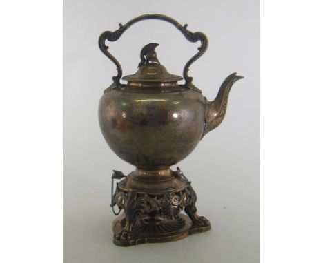 A large Victorian silver tea kettle on stand with burner lamp, the globular body with engraved classical Greek chariot scene,