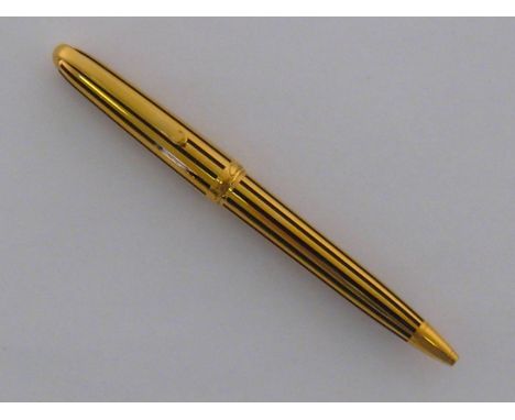 CARTIER Louis Cartier 'Dandy', a gold plated and black enamel limited edition roller ball pen, no. 0353/1847, without paperwo