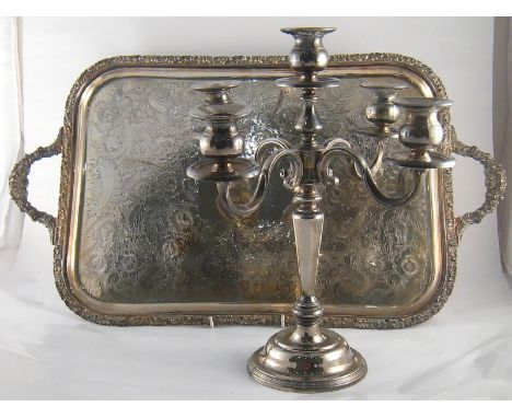 Silver plate. A five light candelabrum, 32cm. spread, and a two handled tray retailed by Harrods, 36x62cm. 