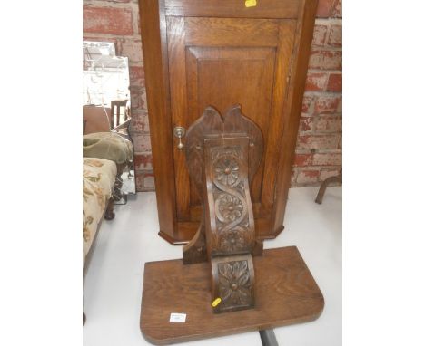 small oak corner cupboard and heavily carved shelf