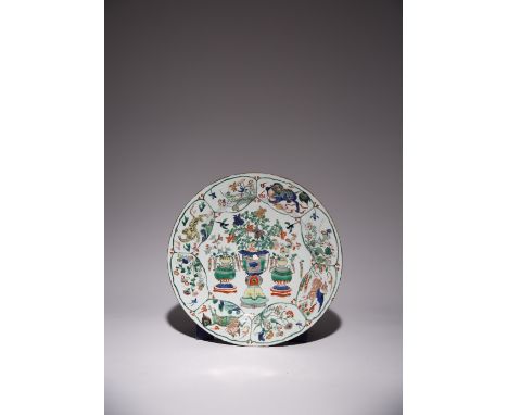 A CHINESE FAMILLE VERTE 'HUNDRED ANTIQUES' DISH FROM THE COLLECTION OF AUGUSTUS THE STRONG SIX CHARACTER KANGXI MARK AND OF T