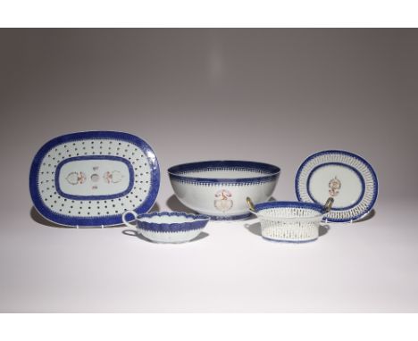 FIVE CHINESE BLUE AND WHITE ARMORIAL ITEMS LATE 18TH CENTURY Comprising: a punch bowl, a twin handled reticulated basket and 