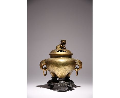 A CHINESE BRASS TRIPOD INCENSE BURNER AND COVER LATE QING DYNASTY The body engraved with a water-dragon, a pagoda, and with t