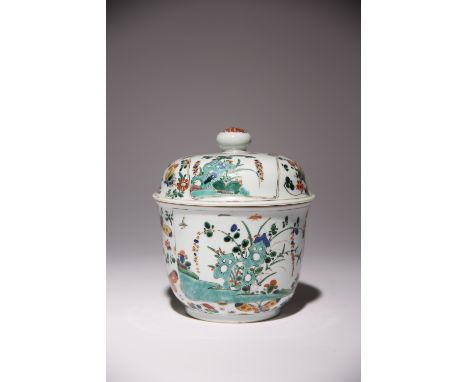 A CHINESE FAMILLE VERTE CIRCULAR BOWL AND COVER KANGXI 1662-1722 Decorated with rectangular panels containing floral sprays a