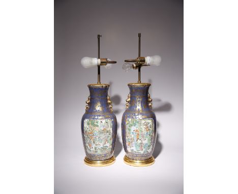 A PAIR OF CHINESE FAMILLE VERTE AND POWDER BLUE-GROUND 'FIGURAL' VASES 19TH CENTURY Each decorated with two panels depicting 