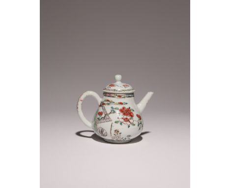 A CHINESE FAMILLE ROSE 'TWO QUAILS' TEAPOT AND COVER 18TH CENTURY The pear-shaped body enamelled with two quails beside bambo