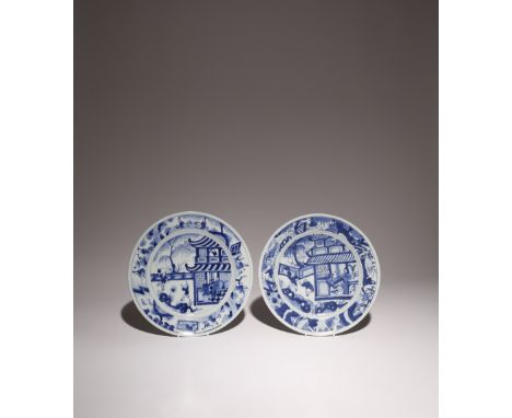 TWO SIMILAR CHINESE BLUE AND WHITE PLATES KANGXI 1662-1722 Each depicting figures in a pavilion and children playing in a fen