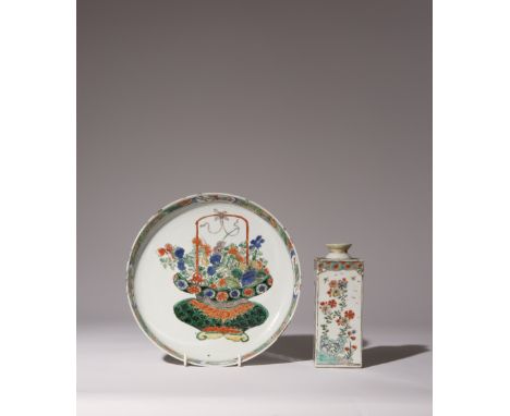 A CHINESE FAMILLE VERTE DISH AND A SQUARE VASE KANGXI 1662-1722 The dish painted with a basket of flowers, a vase with altern