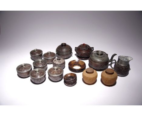 A GROUP OF CHINESE CARVED COCONUT AND PEWTER ITEMS LATE QING DYNASTY Comprising: a teapot, cover and strainer, a cream jug, e