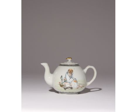A CHINESE 'FIGURAL' TEAPOT AND COVER REPUBLIC PERIOD Painted in enamels depicting the immortal Li Tieguai sitting next to a t