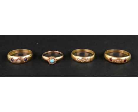 A group of four Victorian gold and gem rings; comprising; an 18ct gold and small diamond three stone gypsy ring, Birmingham 1