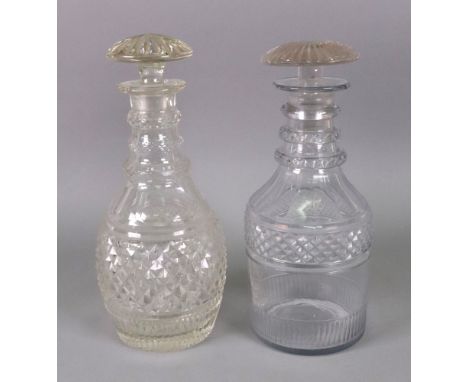 A George III glass decanter with triple ring neck and mushroom stopper, facet cut above a band of diamond cutting with a lowe