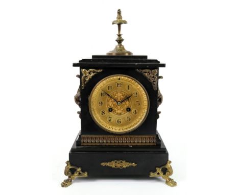 Rotig Havre; a French black marble gilt metal mounted mantel clock, late 19th century, with turned and foliate cast finial, t