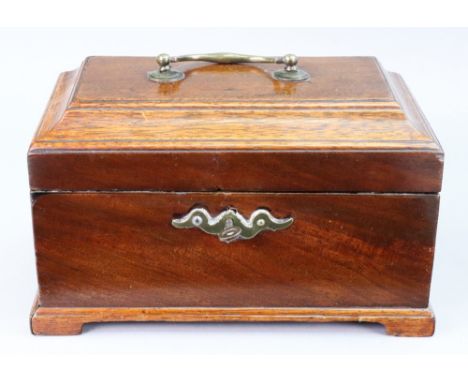 A George III rectangular mahogany tea caddy, the moulded hinged top enclosing a later lined interior, on shaped apron stand, 