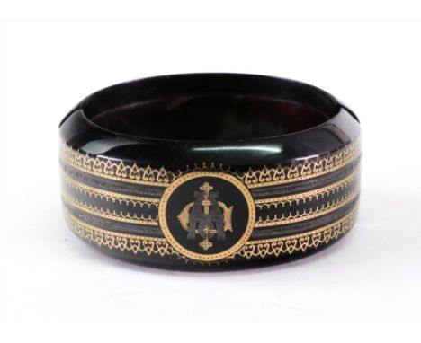 A Victorian tortoiseshell pique broad hinged bangle, currently in two pieces, approx 3cm wide; and a Victorian cartouche shap