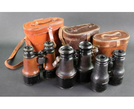 A pair of Victorian Japanned and leather cased field glasses, Dolland London, a similar pair of Nautique glasses, Iris de Par