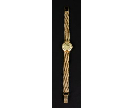 Tissot, a lady's 9ct gold cased bracelet watch, round brushed-golden dial with black baton numerals and hands, two piece oblo