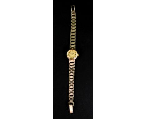 Omega, a lady's 9ct gold cased bracelet watch, circa 1966, the golden dial with raised gilt baton numerals and hands, two pie