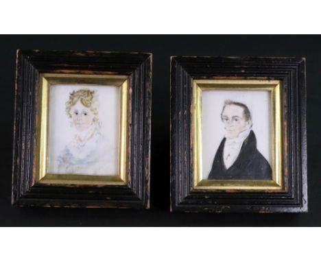 English School, 19th Century, A portrait miniature of a gentleman in a black coat; and a companion, his wife, watercolour and