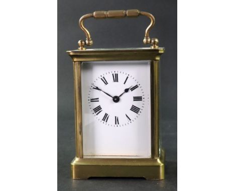 A brass cased carriage timepiece, first half 20th century, with lever platform escapement and Roman numerals, 14cm high, with