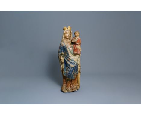 Full title: A large polychromed limestone figure of a Madonna with child, Champagne or Lorraine province, France, 2nd half 14