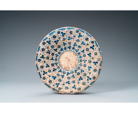 Full title: A Hispano-Moresque 'IHS' lusterware dish, Manises, Spain, 15th C.Description: Dia.: 33,5 cmÊThe radiating leaf, f