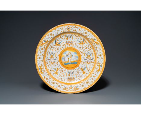 Full title: A polychrome 'grotesque' dish with a putto holding an orb, Willem Jansz. Verstraeten, Haarlem, 1645-1655Descripti