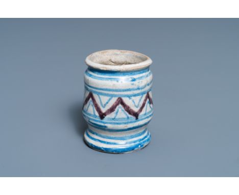 Full title: A small blue, white and manganese maiolica albarello, Antwerp or Northern Netherlands, 16/17th C.Description: H.: