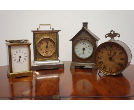 Early 20th century brass carriage timepiece, early 20th century drum alarm clock and two other clocks Condition Report Click 