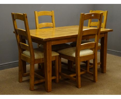 Waxed farmhouse style pine table (140cm x 90cm, H78cm), and four ladder back chairs with upholstered seats