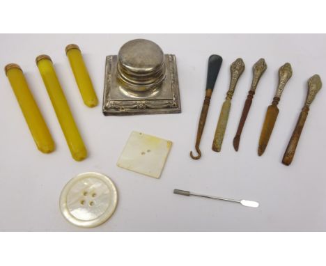 Early 20th century silver inkwell, set of three 9ct gold mounted cigar holders, silver-handled button hooks, silver cocktail 